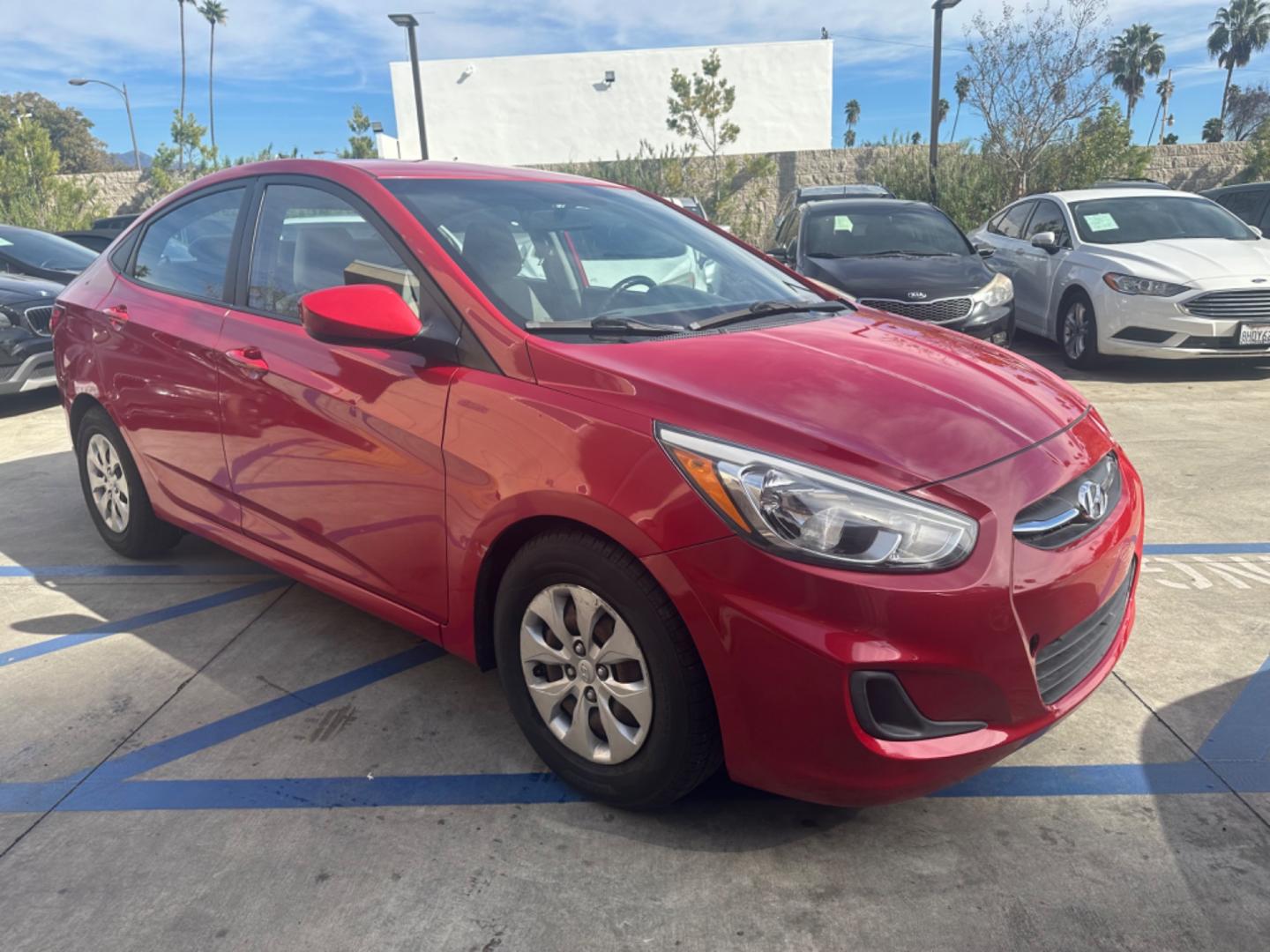 2015 Red /Gray Hyundai Accent GLS Sedan 4D (KMHCT4AE2FU) with an 4-Cyl, 1.6L engine, Auto, 6-Spd w/Overdrive transmission, located at 30 S. Berkeley Avenue, Pasadena, CA, 91107, (626) 248-7567, 34.145447, -118.109398 - The 2015 Hyundai Accent 4-Door Sedan stands as a testament to Hyundai's commitment to quality, efficiency, and value. Located in Pasadena, CA, our dealership specializes in providing a wide range of used BHPH (Buy Here Pay Here) cars, trucks, SUVs, and vans, including the remarkable Hyundai Accent. - Photo#8